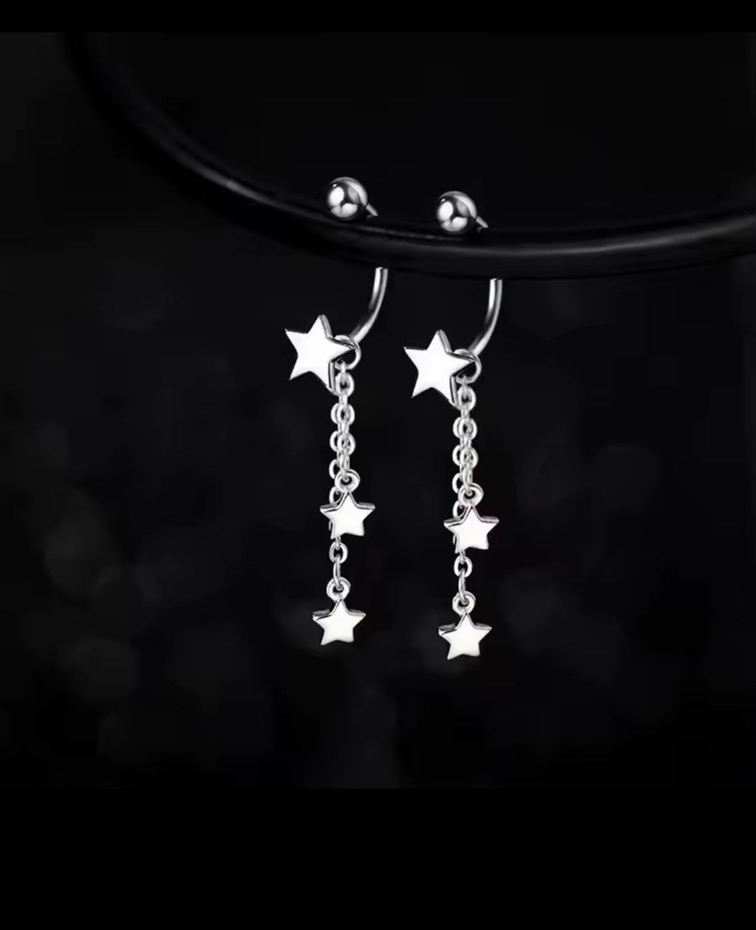 Dangling Star Screw on Earrings